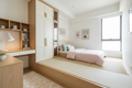 Girls’ bedroom with tatami platform, writing desk, and wardrobe